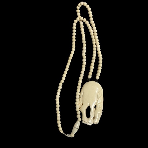 Vintage Carved Bone Crouching Horse Pendant Necklace